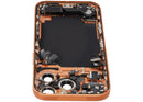 Tapa trasera Cosmic Orange usada para iPhone 17 Pro US, con puerto de carga flex y pequeños componentes.