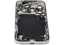 Tapa trasera plateada usada para iPhone 17 Pro, con puerto de carga y piezas pequeñas, lista para reparación.