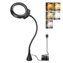Lámpara LED de aumento 5X con brazo articulado y base de pinza para soldadura y trabajos de precisión.