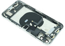 Tapa trasera usada plateada para iPhone XS (A1920, A2097) con puerto de carga y componentes preinstalados.