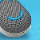 Altavoz Bluetooth Skullcandy Kilo XT gris claro, portátil, con asa, ideal para exteriores y sonido potente.