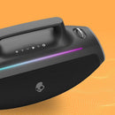 Altavoz inalámbrico Skullcandy Barrel Party negro, diseño robusto y asa de transporte para fiestas.