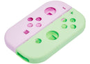 Carcasa compatible para control Joy Con Nintendo Switch de color Morado y Verde en Quetzaltenango.