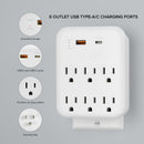 Cargador multipuerto Brookstone blanco con 6 puertos, incluyendo 1 USB-C y 1 USB-A, para carga rápida.