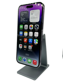 iPhone 14 Pro Max Deep Purple, seminuevo, 128GB, con pantalla encendida mostrando la interfaz de iOS.