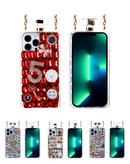 Case de diseño para iPhone 13 Pro con grandes piedras, cuerda larga de metal y cuero en Quetzaltenango.
