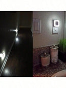 Set de 4 luces nocturnas SlowBack con encendido/apagado automático, diseño compacto y discreto, ideal para dormitorios.