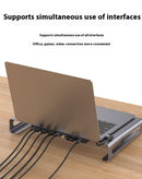 Docking station Onten 8 en 1 plateada con puertos USB, HDMI y Ethernet para laptop, vista frontal.