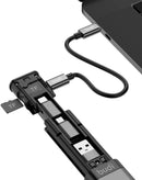 Puerto de carga Budi 9 en 1 Essential Travel negro, con múltiples adaptadores y cable de datos.