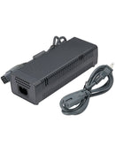 Adaptador de corriente AC negro para Xbox 360, modelo HP-A1502R2, con cables de conexión visibles.